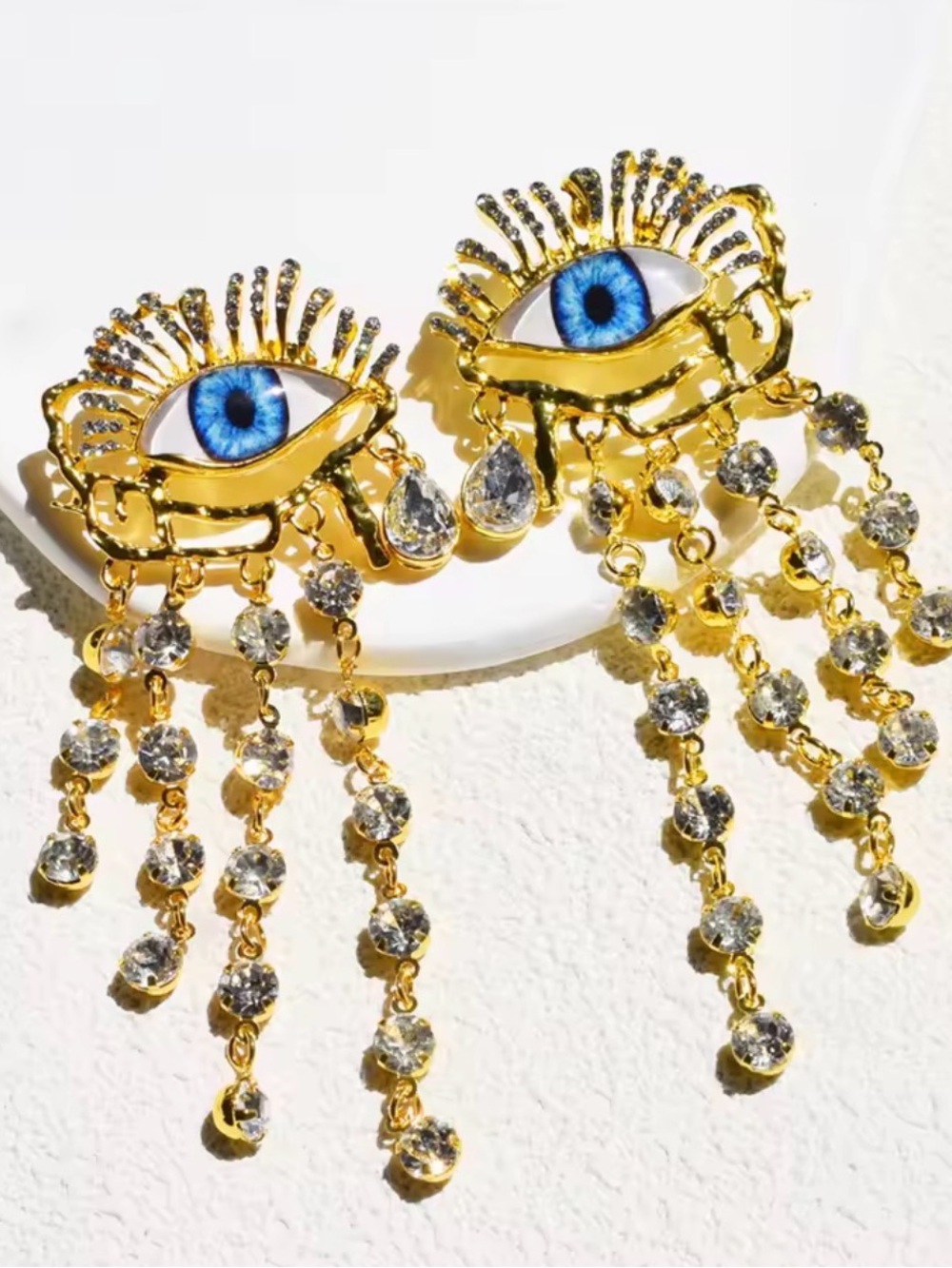 Gold-tone Blue Eye Dangle Earrings with Crystal Fringe - Picture 2 of 3